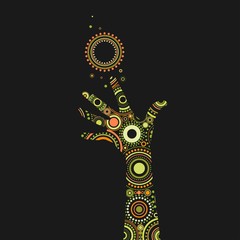 Fototapeta na wymiar Fantasy painted hand with bright ethnic ornament of circles and dots. Isolated on black background.