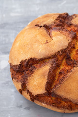 portuguese corn bread broa on ceramic background