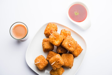Crispy Paneer popcorn is a popular party snack and an appetiser. selective focus