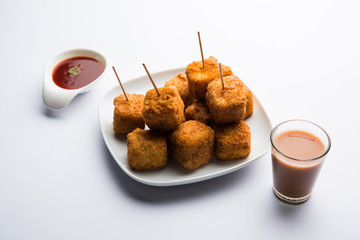 Crispy Paneer popcorn is a popular party snack and an appetiser. selective focus