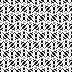 Seamless woodblock printed monochrome ethnic floral pattern. Traditional oriental ornament of North India, flower garland wave motif, black on white background. Textile design.