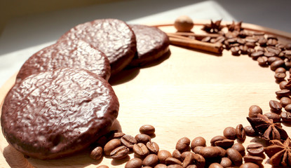 biscuit cookies with cinnamon, coffee grainsare on a white background