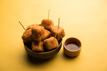 Crispy Paneer popcorn is a popular party snack and an appetiser. selective focus