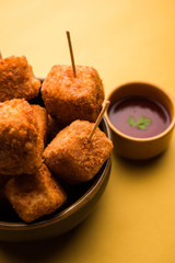 Crispy Paneer popcorn is a popular party snack and an appetiser. selective focus