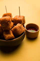 Crispy Paneer popcorn is a popular party snack and an appetiser. selective focus