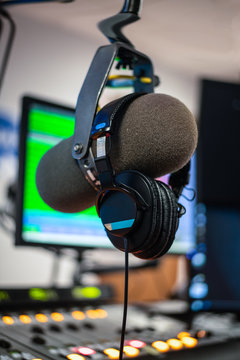 Radio studio microphone and headphones