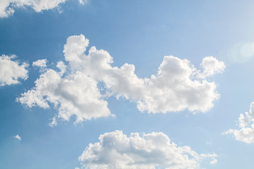 Obraz na płótnie Canvas white clouds in the blue sky. background
