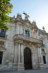 Fototapeta premium Main facade of the Rectorship of Public University of Seville, former Royal Tobacco Factory (Real Fabrica de Tabacos). Andalusia, Spain