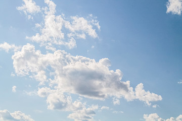 white clouds in the blue sky. background