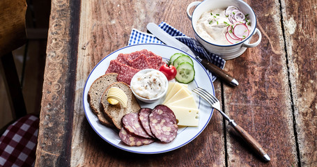 Tavern lunch with venison sausage and cheese