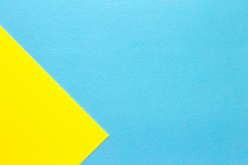 Blue and yellow pastel paper geometric background for desig, copy space
