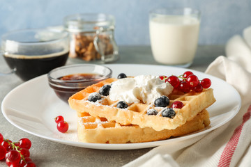 Composition of breakfast with belgian waffles, space for text