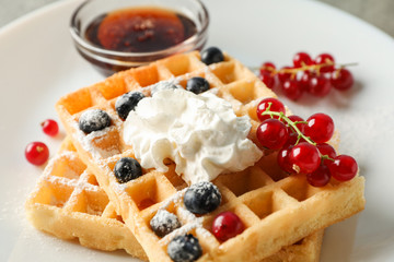 Composition of breakfast with belgian waffles, space for text