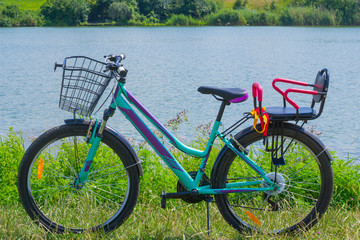 bike on the grass by the lake