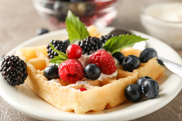 Composition of breakfast with belgian waffle, space for text