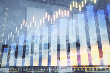 Stock market chart with trading desk bank office interior on background. Double exposure. Concept of financial analysis