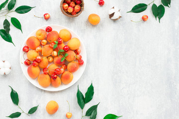 Summer fruits on grey background, flat lay, top view
