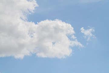 white clouds in the blue sky. background