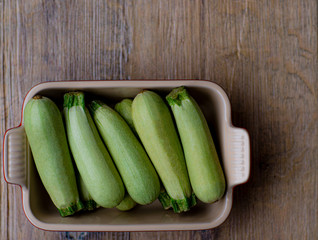 Mini zucchini  new crop lie baking dish.