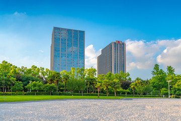 White beach, green lawn and business building, Daning Tulip Park, Shanghai, China