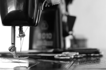 man working on a sewing machine
