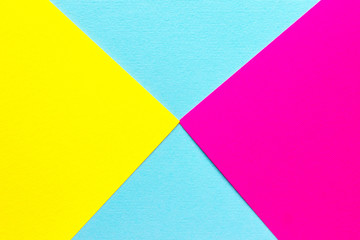 Pink, yellow and blue pastel paper background for design with copy space