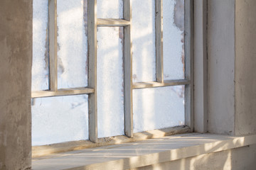 old wooden window with winter frost