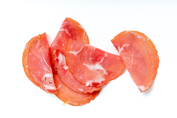 Thin ham slices isolated on white background. Snack idea