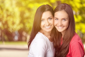 Obraz premium Happy Mother and daughter on background