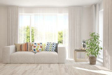Stylish room in white color with sofa and summer landscape in window. Scandinavian interior design. 3D illustration
