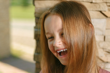 portrait of a happy child. little girl smiling.