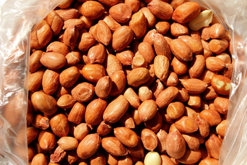 Peanuts background. Cropped shot of peanuts. Healthy food background. 