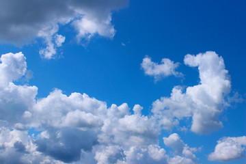 Naklejka na ściany i meble Blue sky and white clouds. Beautiful nature background. Freedom, nature concept.