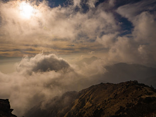 Mountain cliff sunrise