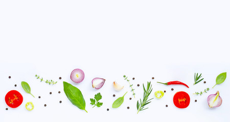 Various fresh vegetables and herbs on white. Healthy eating concept