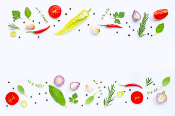 Various fresh vegetables and herbs on white. Healthy eating concept
