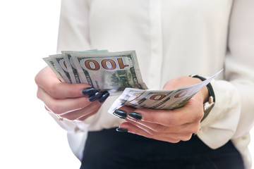 Female hands offering dollar banknotes close up