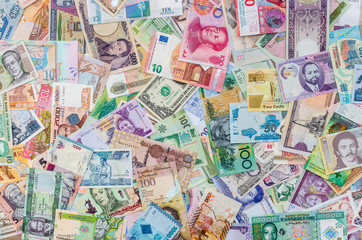 Mix of different banknotes, currency in all countries in world