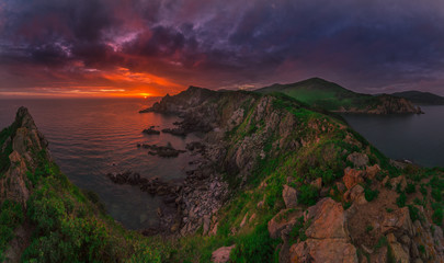 Fototapeta na wymiar Sunset over the coastal cliffs