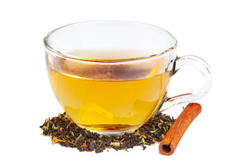 Black tea in a cup of glass. Mint and tea leaves. On white, isolated background