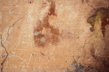Cracked and peeling paint old wall background.