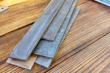 Blade steel plates handmade knife making materials supply tempered forged hardened heat treated quenched hard-tempered close up selective focus