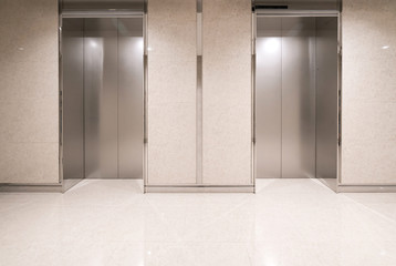 The elevator entrance is in the shopping mall