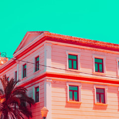 Hotel and palm tree in infrared style