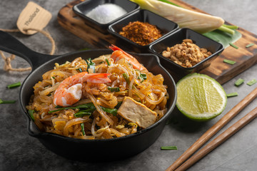 Home Made Pad thai with Shrimp and Vegetables on Marble table