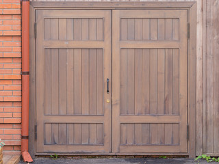 wooden brown gate in the street