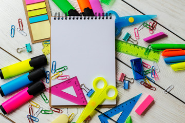 School and office supplies on a wooden