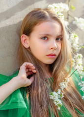 portrait of little girl outdoors in summer
