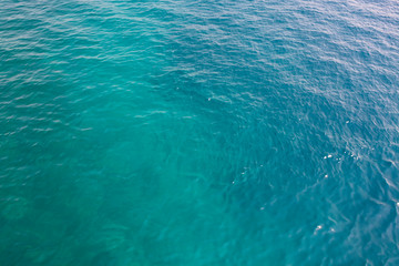 Obraz premium Blue sea water blurred ripple background. Aegean Sea, Turkey