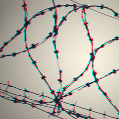 Barbed wire on country border. Barbwire on fence for prohibition of illegal aliens crossing. Glitch...